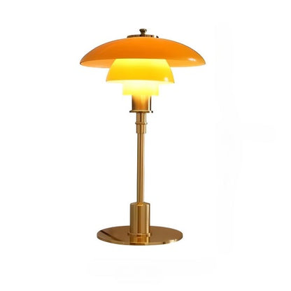 Maisie table lamp for living room, home office, bedroom, or accent lighting. Modern home decor accessory and lighting. Amber/Gold color.