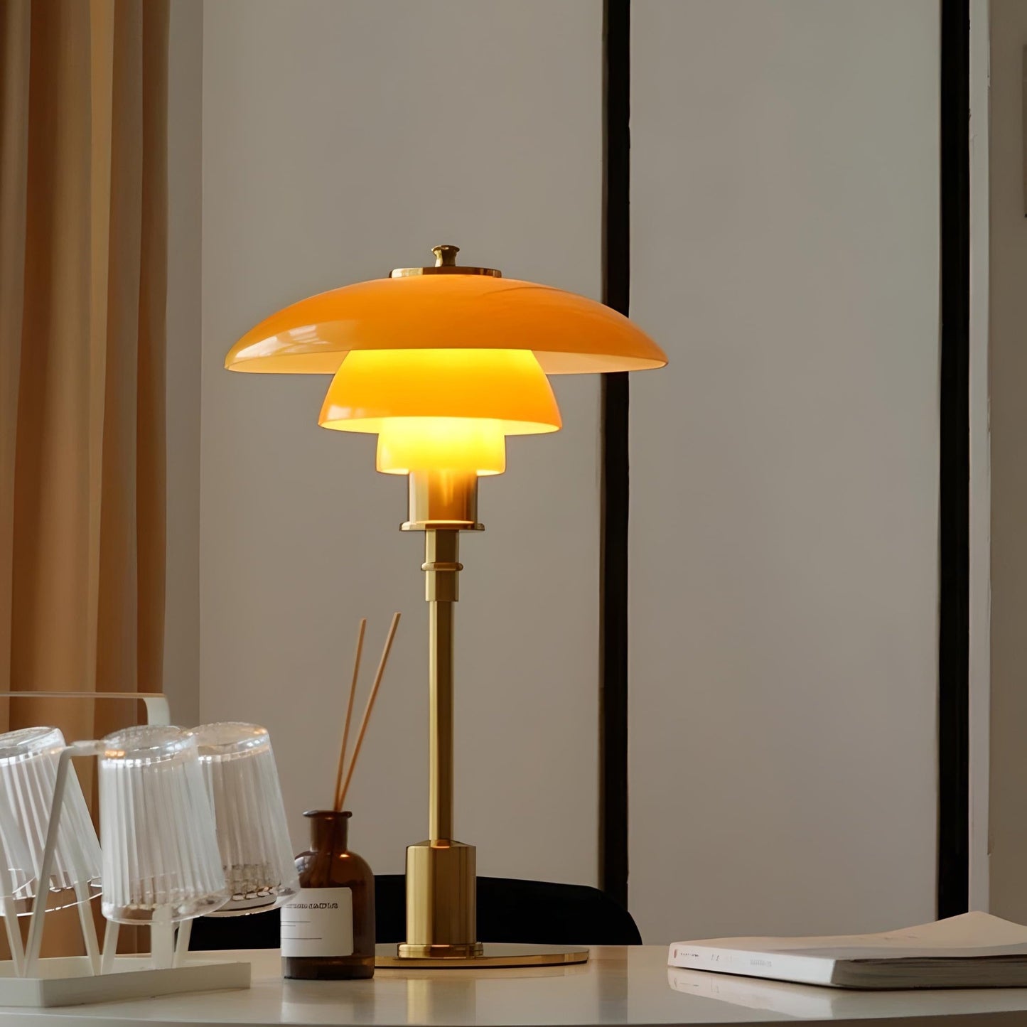 Maisie table lamp for living room, home office, bedroom, or accent lighting. Modern home decor accessory and lighting. Amber/Gold color.