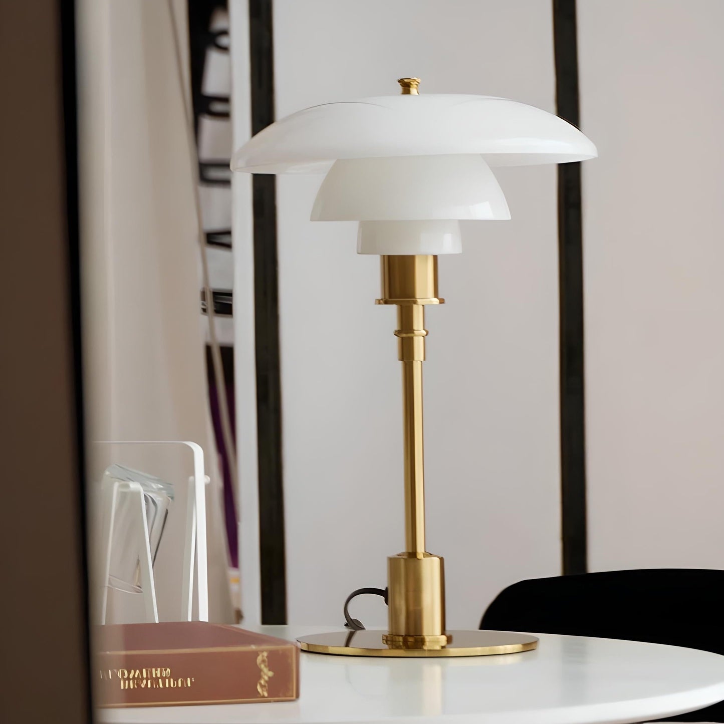 Maisie table lamp for living room, home office, bedroom, or accent lighting. Modern home decor accessory and lighting. White/Gold color.