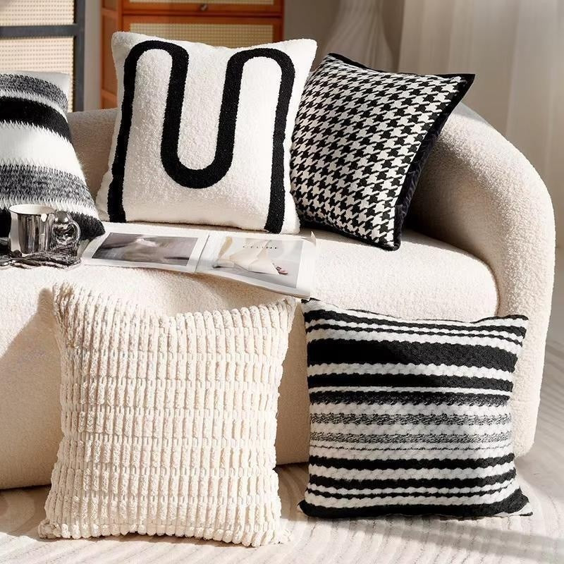 Ozias throw pillow cover for accent pillows and home decor. Classic black and white colors and patterns.