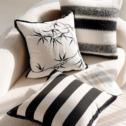 Ozias throw pillow cover for accent pillows and home decor. Classic black and white colors and patterns.