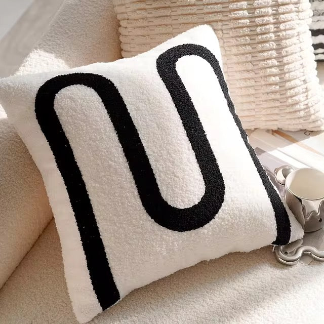 Ozias throw pillow cover for accent pillows and home decor. Classic black and white colors and patterns.