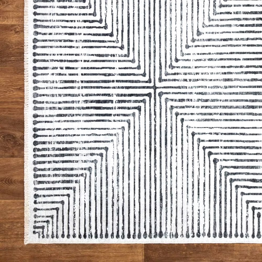 Valencia area rug for modern living rooms, bedrooms, dining rooms, office, or study. Classic minimalist black stripes and white background color.