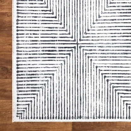 Valencia area rug for modern living rooms, bedrooms, dining rooms, office, or study. Classic minimalist black stripes and white background color.