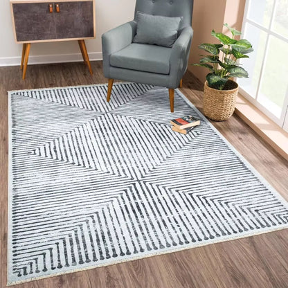 Valencia area rug for modern living rooms, bedrooms, dining rooms, office, or study. Classic minimalist black stripes and white background color.